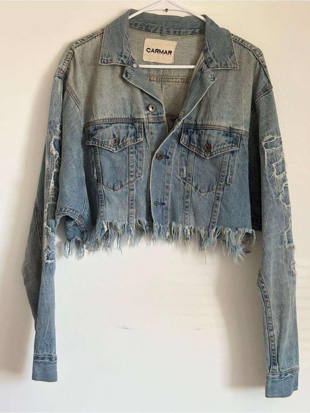 Carmar Blue Distressed Cropped Denim Jacket size Large Sleeves are 25” long.